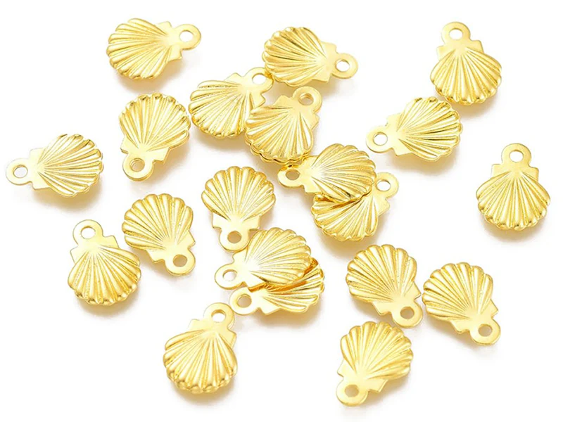10 mini breloques / pendentifs mini coquillages - 7,5 mm - acier inoxydable doré