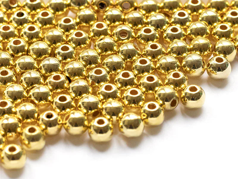 100 perles en plastique rondes - 6 mm - doré