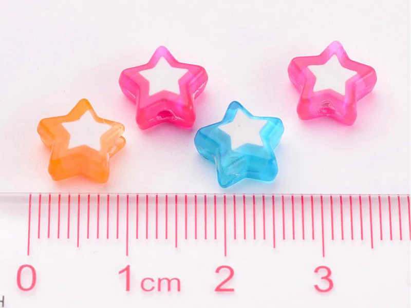 50 perles en plastique étoiles - transparent et blanc - 9x10 mm - Image 5