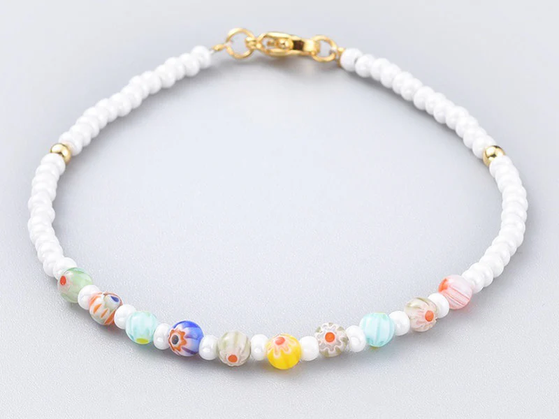 Bracelet blanc à perles millefiori en verre