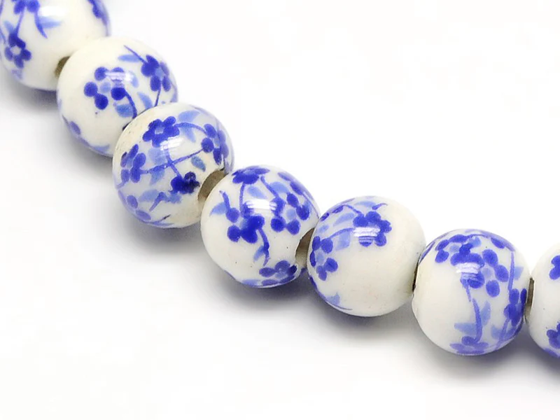Lot de 10 perles en porcelaine - Fleurs bleues - 6 mm