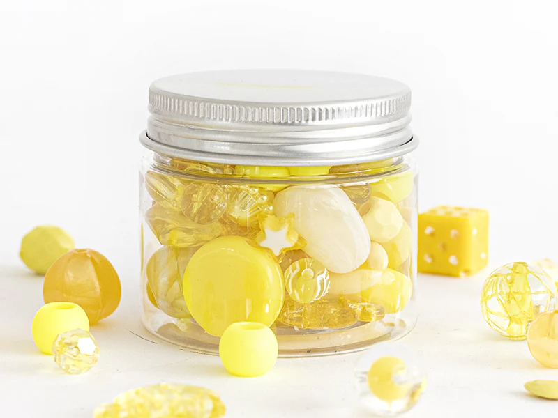 Pot de perles en plastique - nuances de jaune