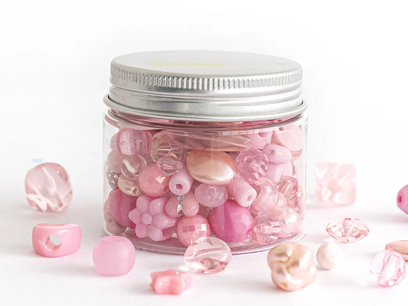 Pot de perles en plastique - nuances de rose